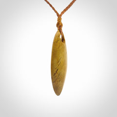 Hand carved New Zealand Flower Jade drop pendant.