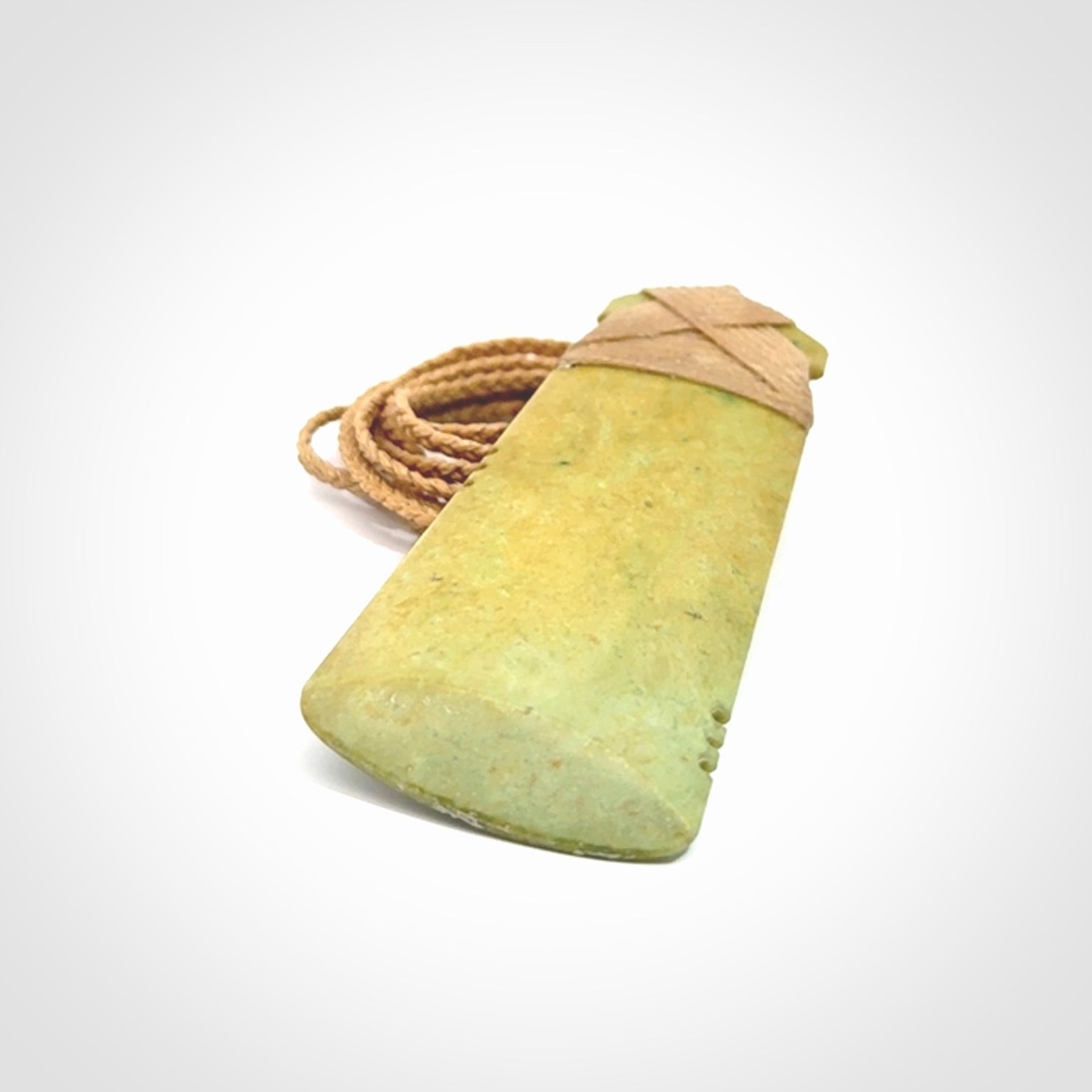 This is a lovely notched toki pendant made from a gorgeous New Zealand Flower Jade.