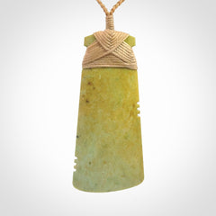 This is a lovely notched toki pendant made from a gorgeous New Zealand Flower Jade.