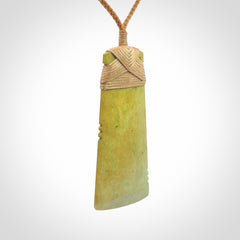 This is a lovely notched toki pendant made from a gorgeous New Zealand Flower Jade.