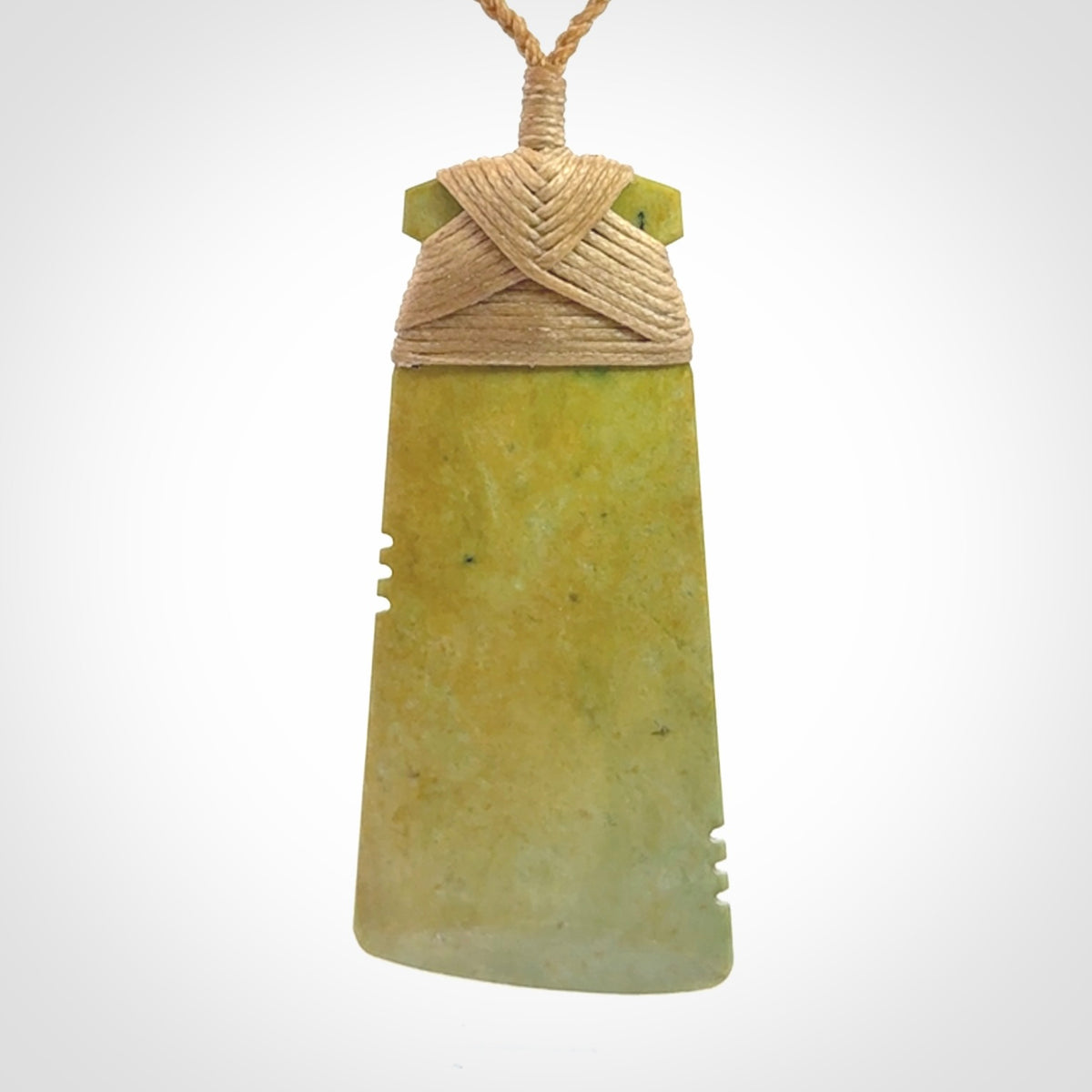 This is a lovely notched toki pendant made from a gorgeous New Zealand Flower Jade.