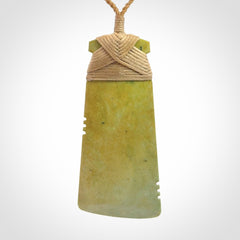 This is a lovely notched toki pendant made from a gorgeous New Zealand Flower Jade.