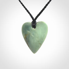 A hand carved small heart pendant made from New Zealand Inanga jade.
