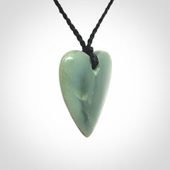 A hand carved small heart pendant made from New Zealand Inanga jade.