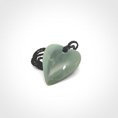 A hand carved small heart pendant made from New Zealand Inanga jade.