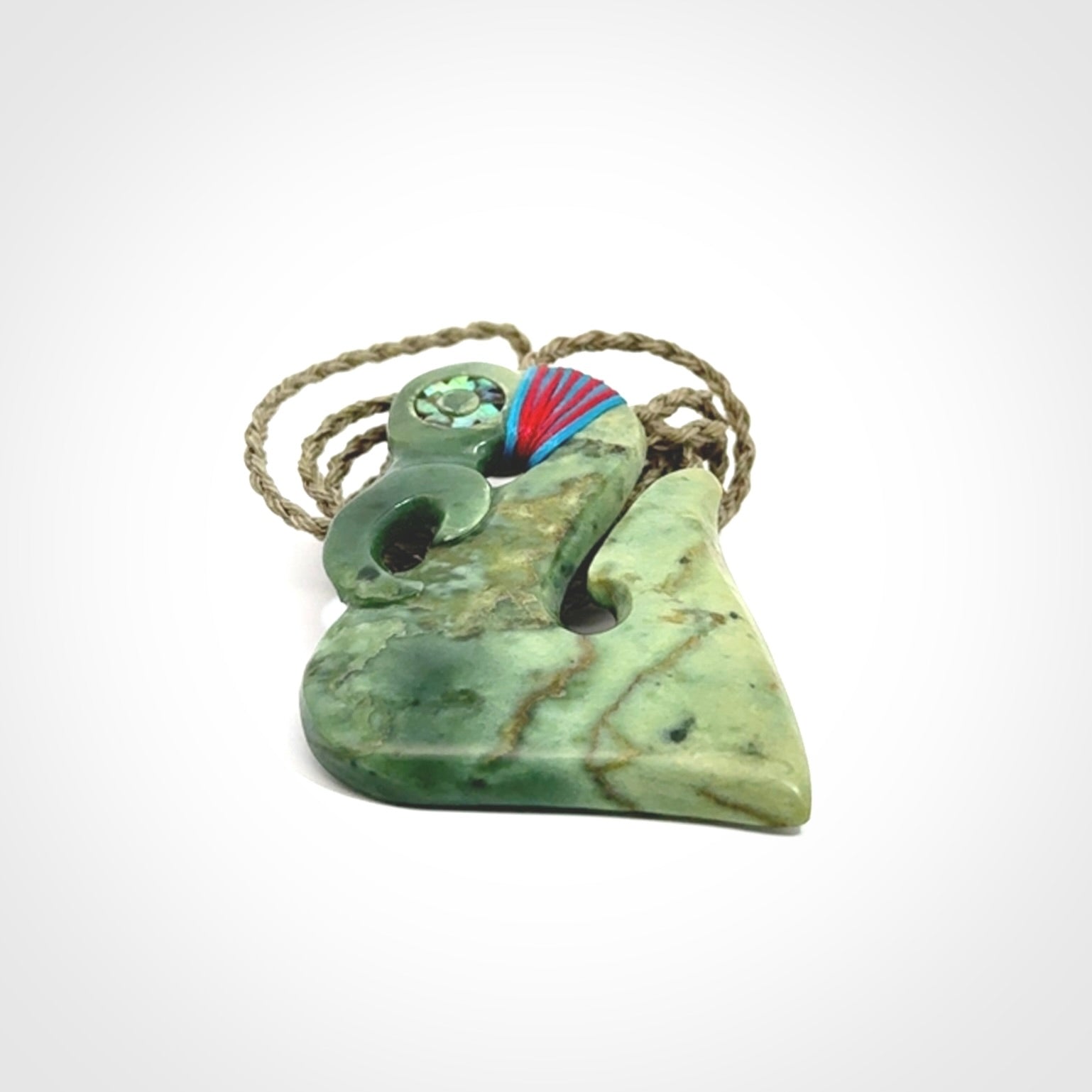 This picture shows a contemporary manaia with hook pendant. The cord colour is khaki and it is length adjustable. This is a very beautiful piece of art to wear.