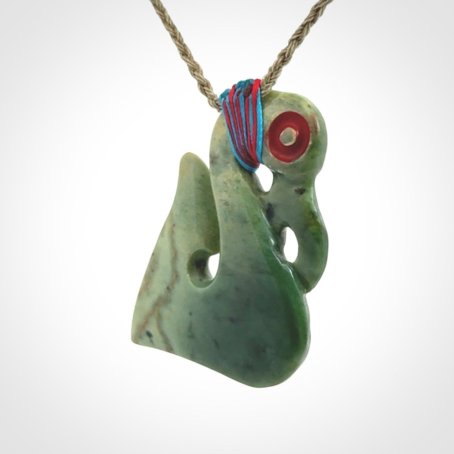 This picture shows a contemporary manaia with hook pendant. The cord colour is khaki and it is length adjustable. This is a very beautiful piece of art to wear.