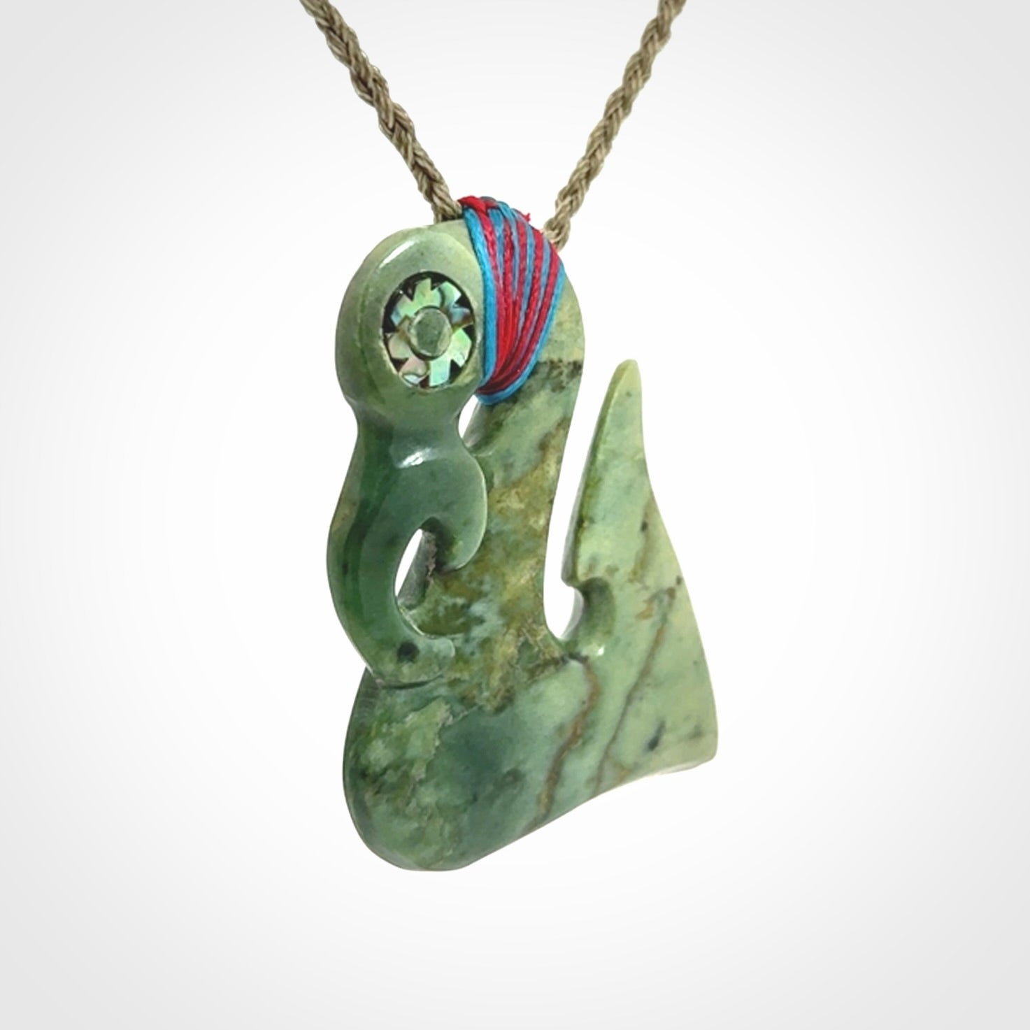 This picture shows a contemporary manaia with hook pendant. The cord colour is khaki and it is length adjustable. This is a very beautiful piece of art to wear.