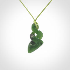 Hand carved small sized, New Zealand jade double twist pendant.