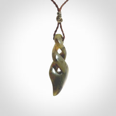 Hand carved small sized, New Zealand jade double twist pendant.