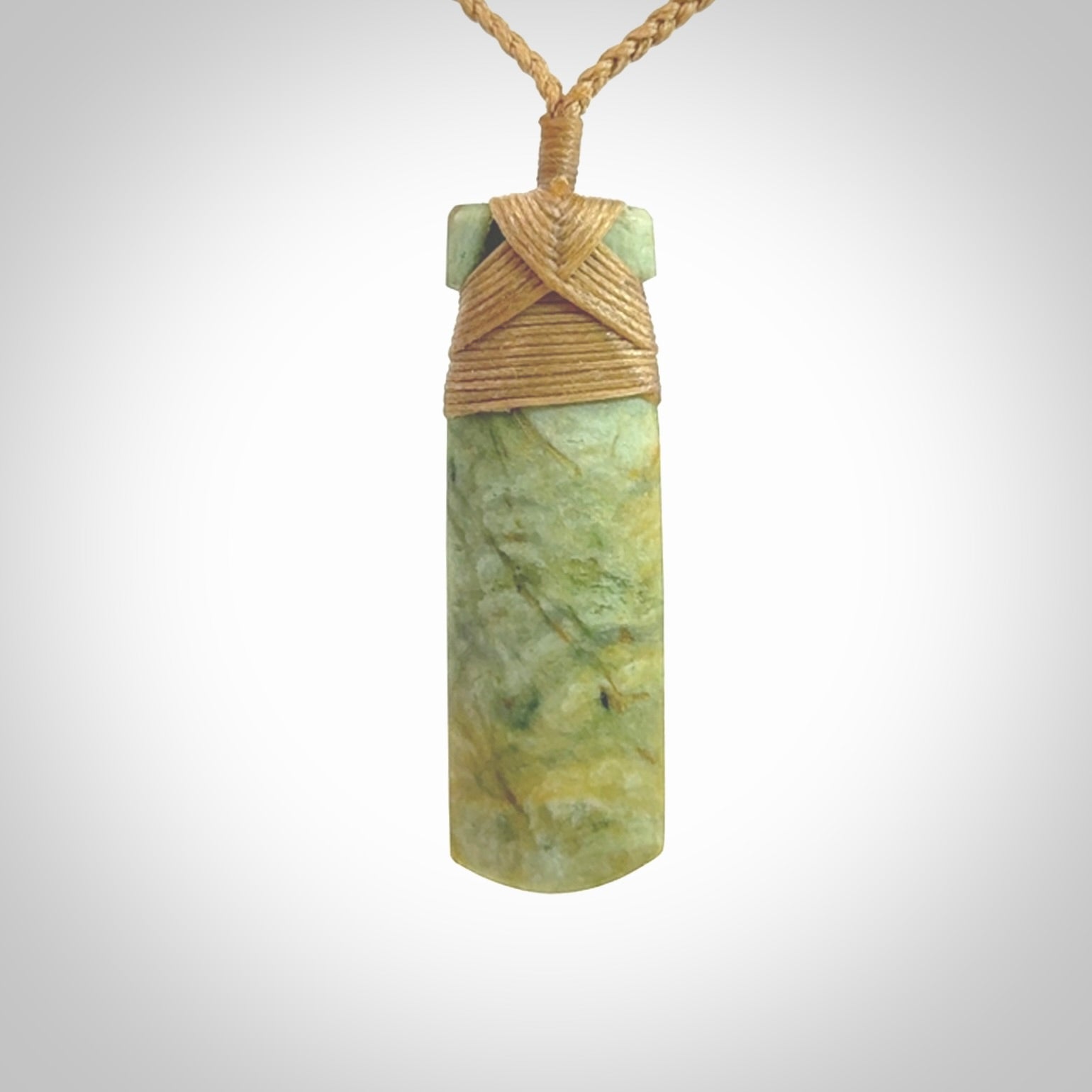 This is a lovely medium sized toki pendant made from a gorgeous New Zealand Flower Jade.
