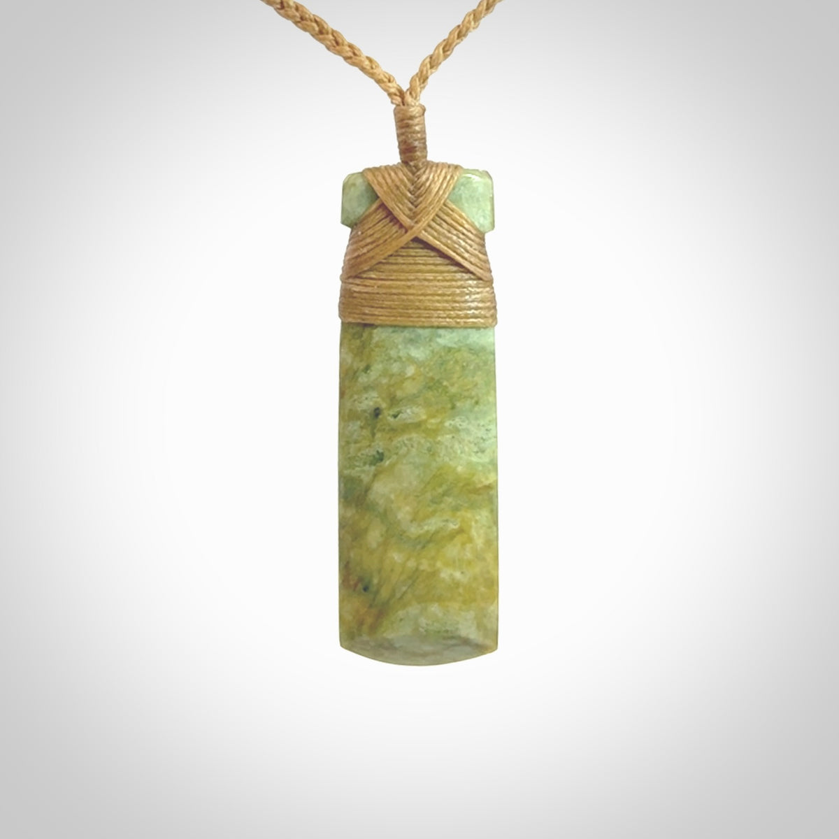 This is a lovely medium sized toki pendant made from a gorgeous New Zealand Flower Jade.