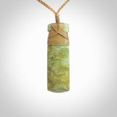 This is a lovely medium sized toki pendant made from a gorgeous New Zealand Flower Jade.