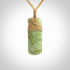 This is a lovely medium sized toki pendant made from a gorgeous New Zealand Flower Jade.