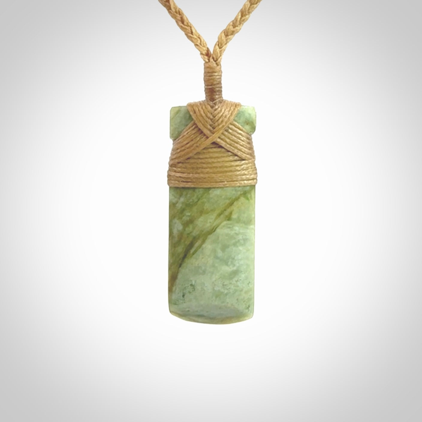 This is a lovely medium sized toki pendant made from a gorgeous New Zealand Flower Jade.