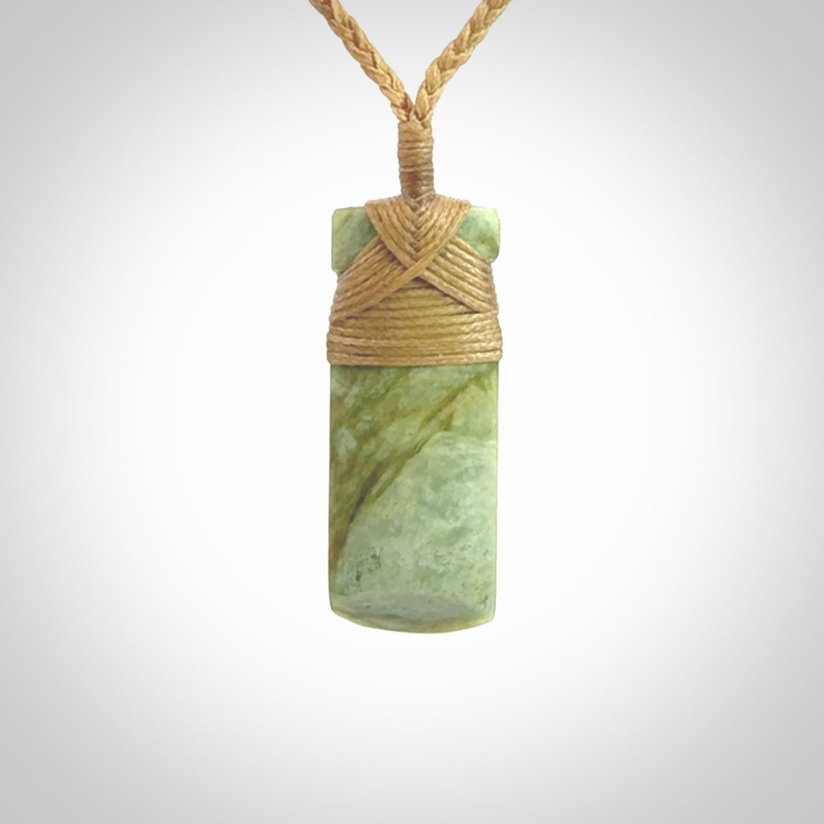 This is a lovely medium sized toki pendant made from a gorgeous New Zealand Flower Jade.