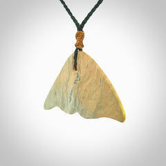 Hand carved New Zealand Jade whale tail pendant.