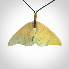 Hand carved New Zealand Jade whale tail pendant.