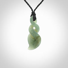 Hand carved small sized, New Zealand Inanga jade double twist pendant.
