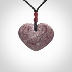 A hand carved heart pendant made from New Zealand Aroha Stone. This is a smaller sized and visually striking piece, beautifully curved and sensuous. The perfect piece of jewellery for someone you love.