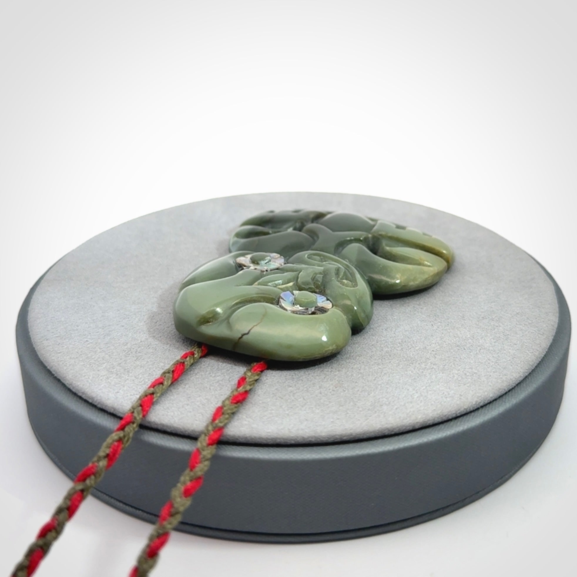 Hand carved New Zealand Jade tiki pendant