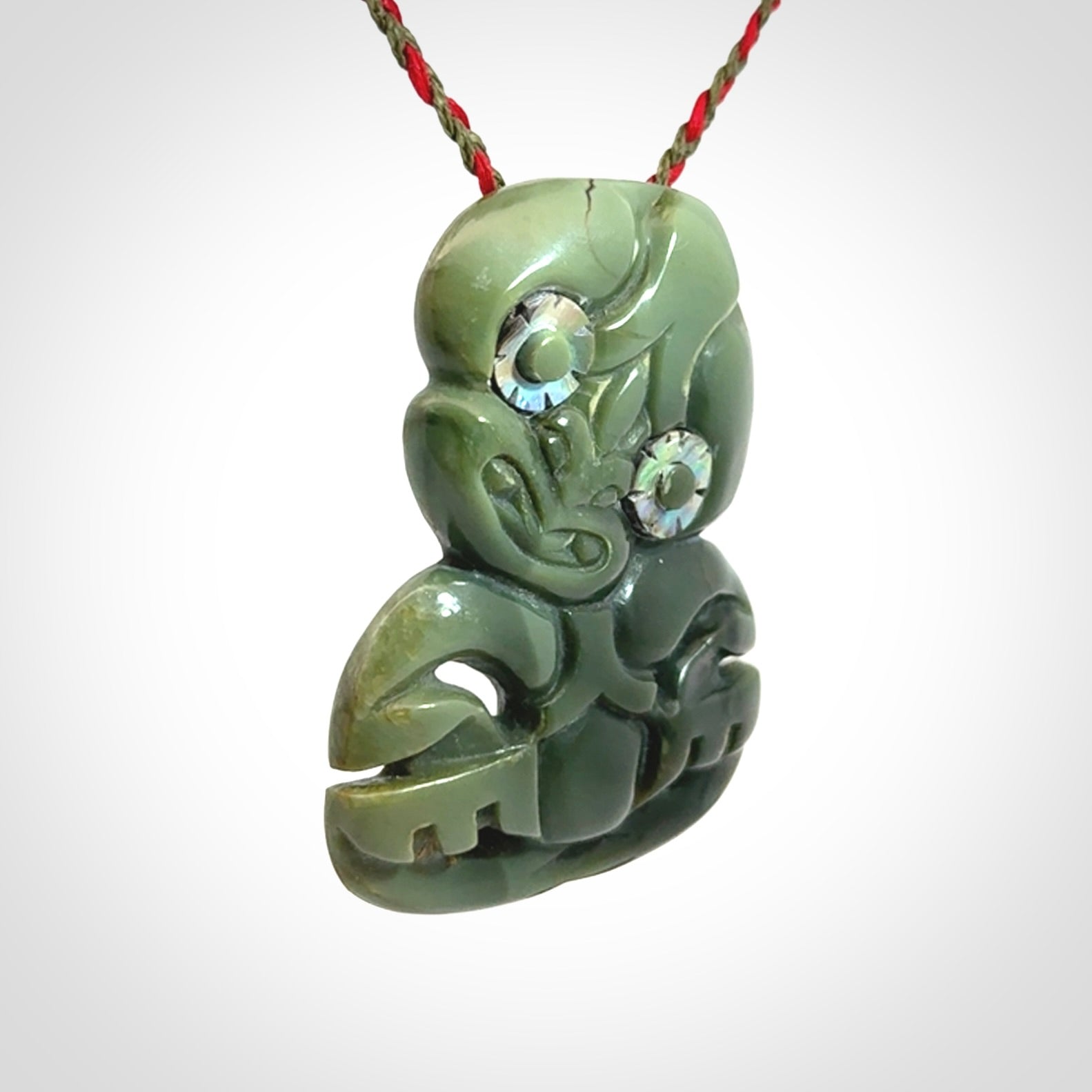 Hand carved New Zealand Jade tiki pendant