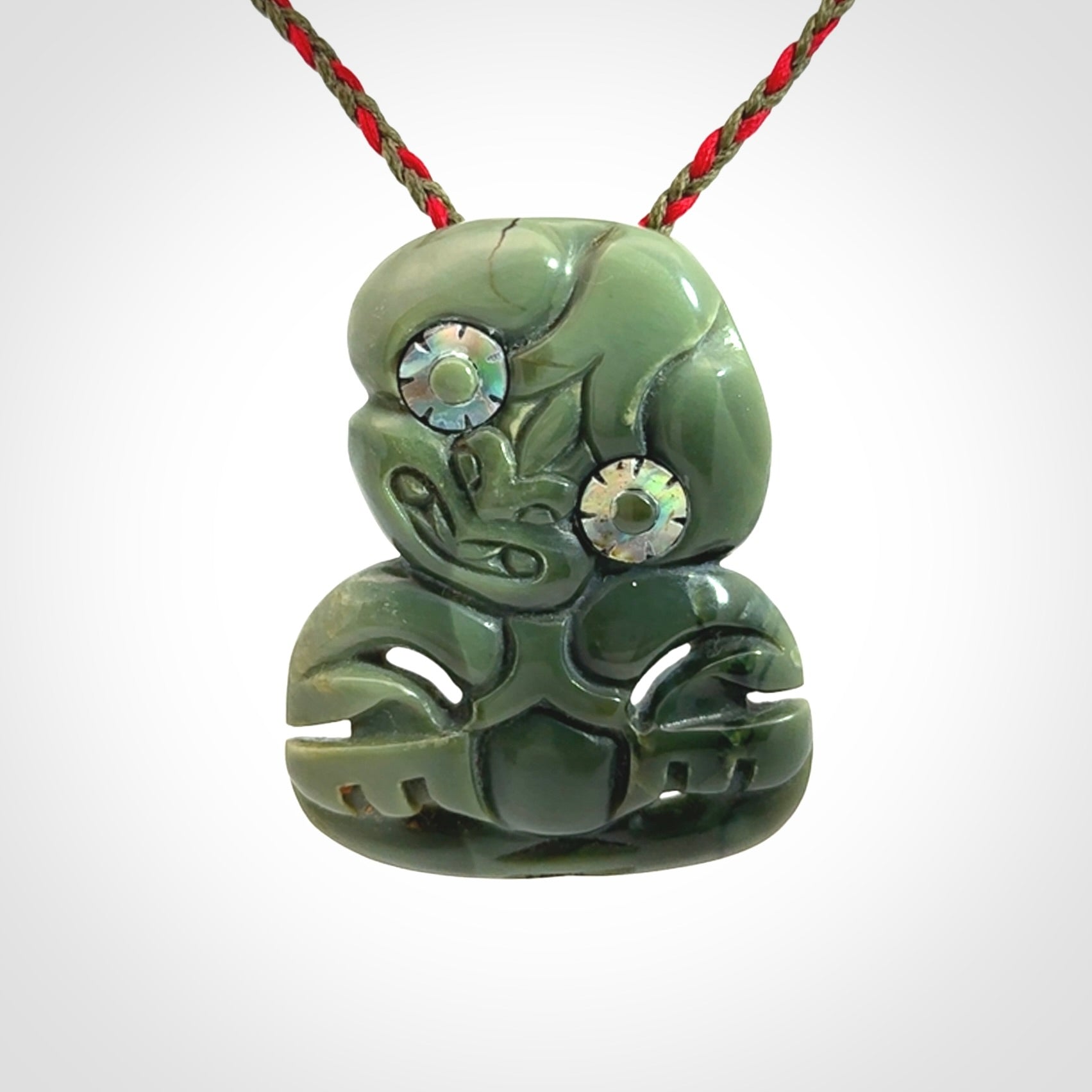 Hand carved New Zealand Jade tiki pendant
