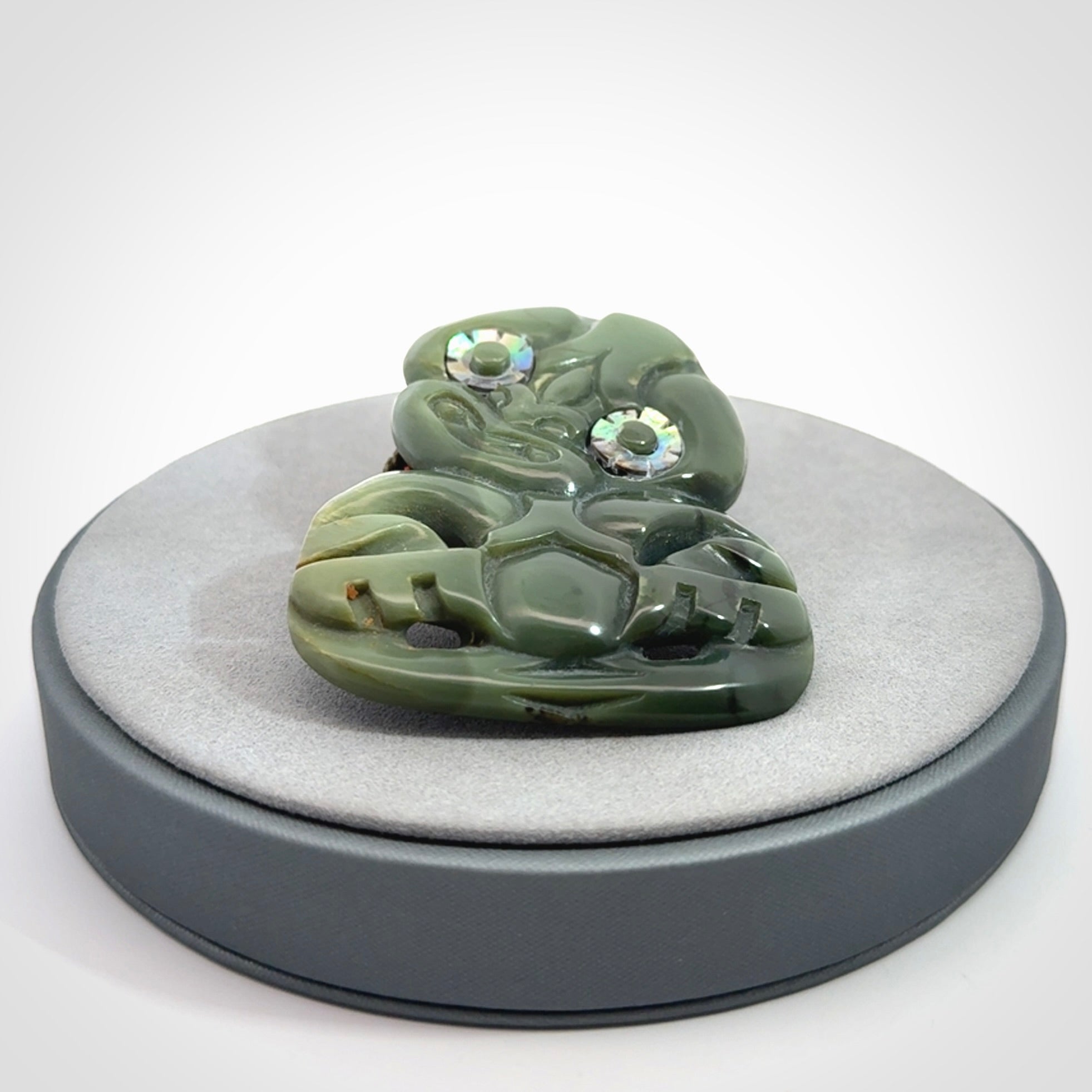 Hand carved New Zealand Jade tiki pendant
