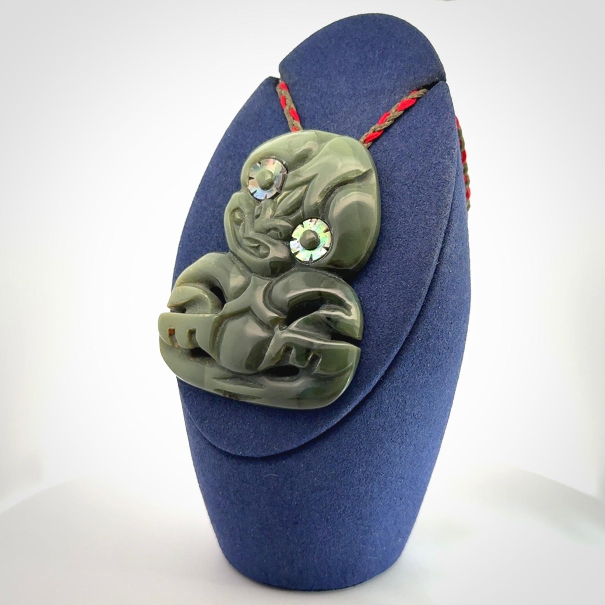 Hand carved New Zealand Jade tiki pendant