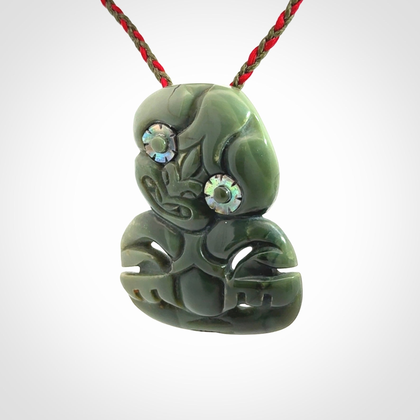 Hand carved New Zealand Jade tiki pendant