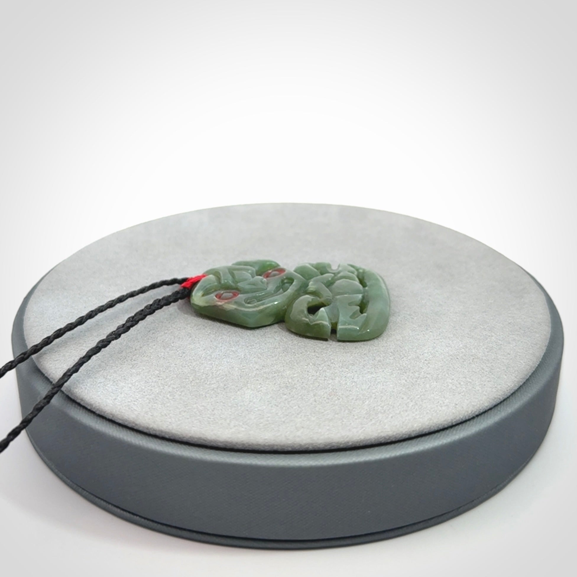 Hand carved New Zealand Jade tiki pendant