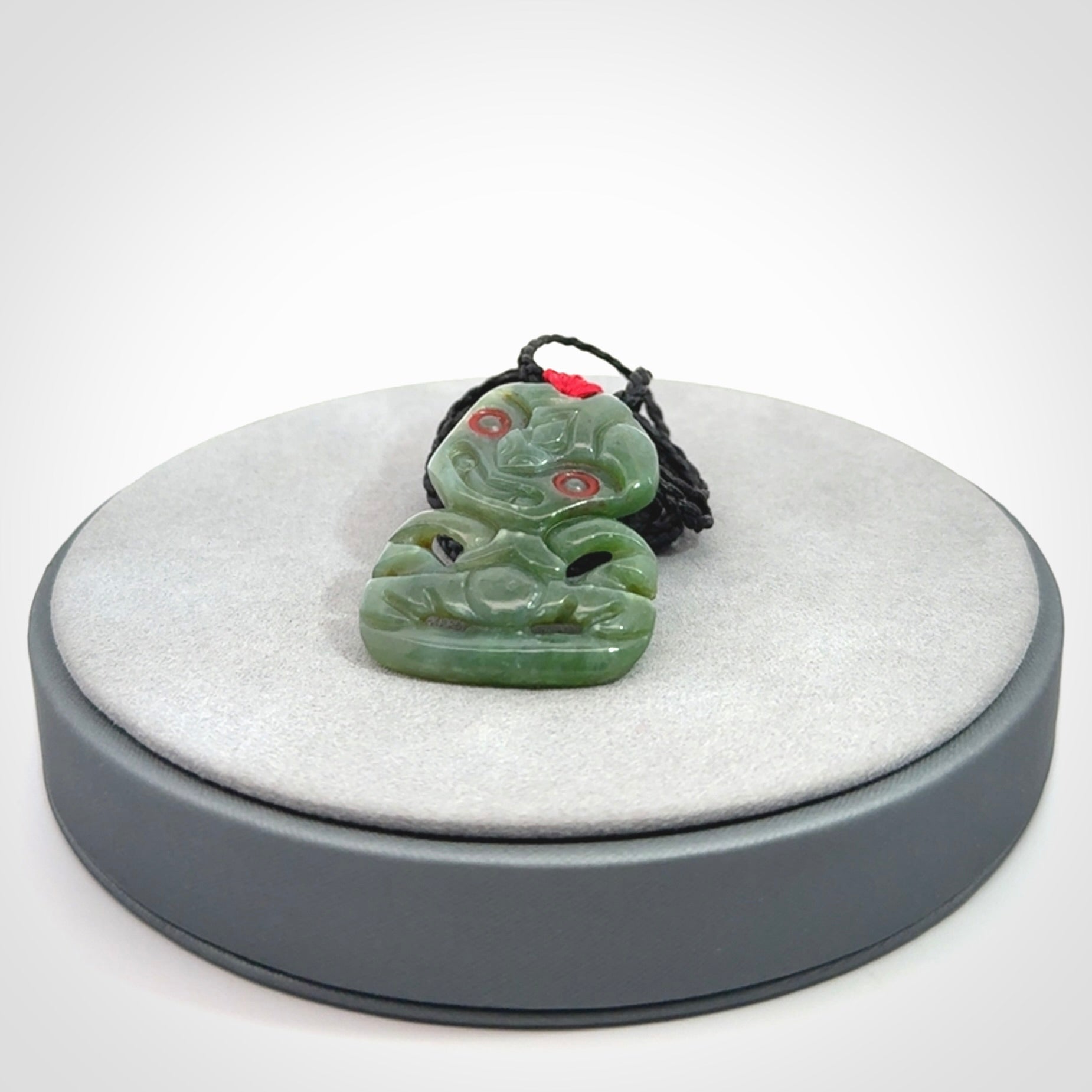 Hand carved New Zealand Jade tiki pendant