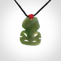 Hand carved New Zealand Jade tiki pendant