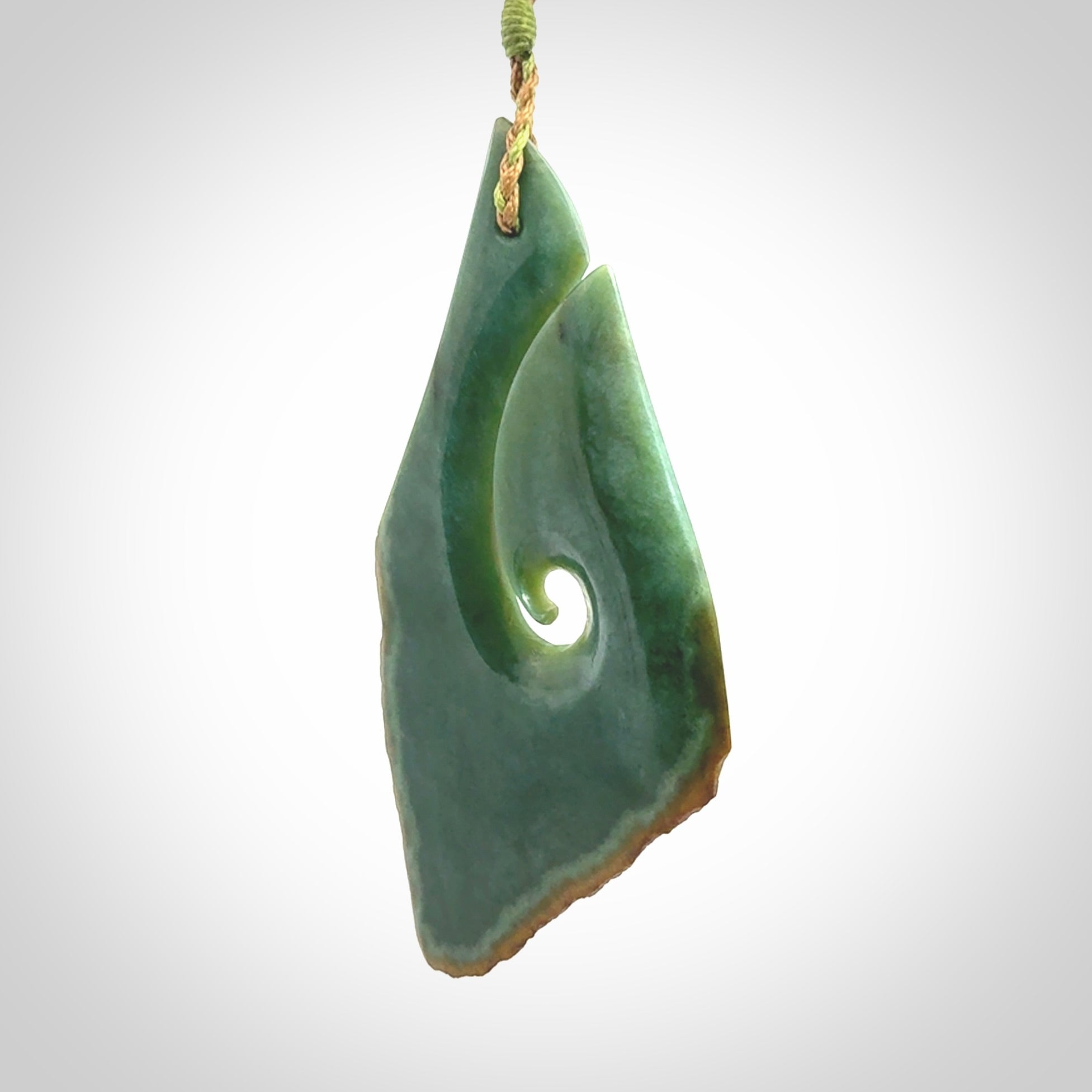 Hand carved New Zealand jade hook, matau pendant.