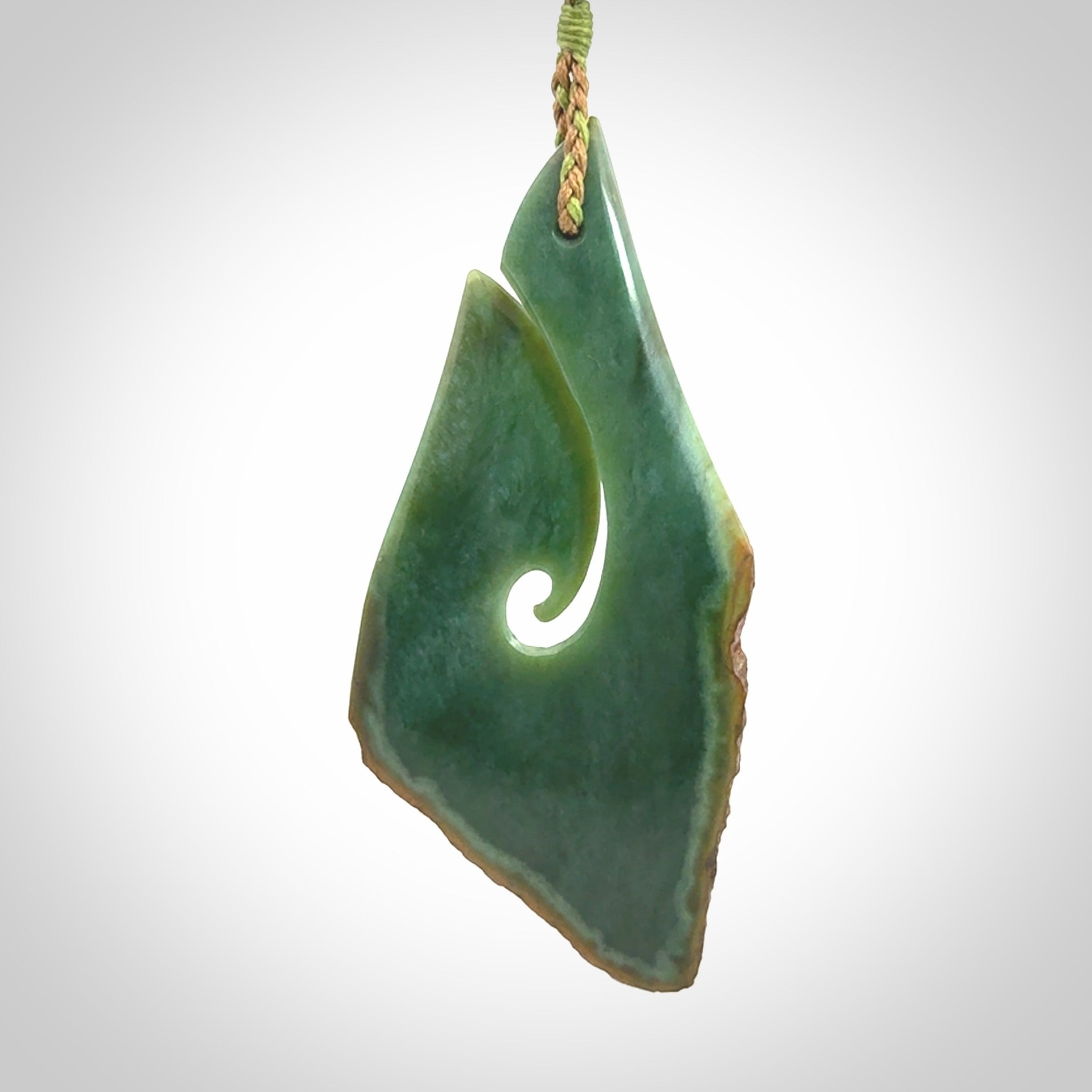 Hand carved New Zealand jade hook, matau pendant.