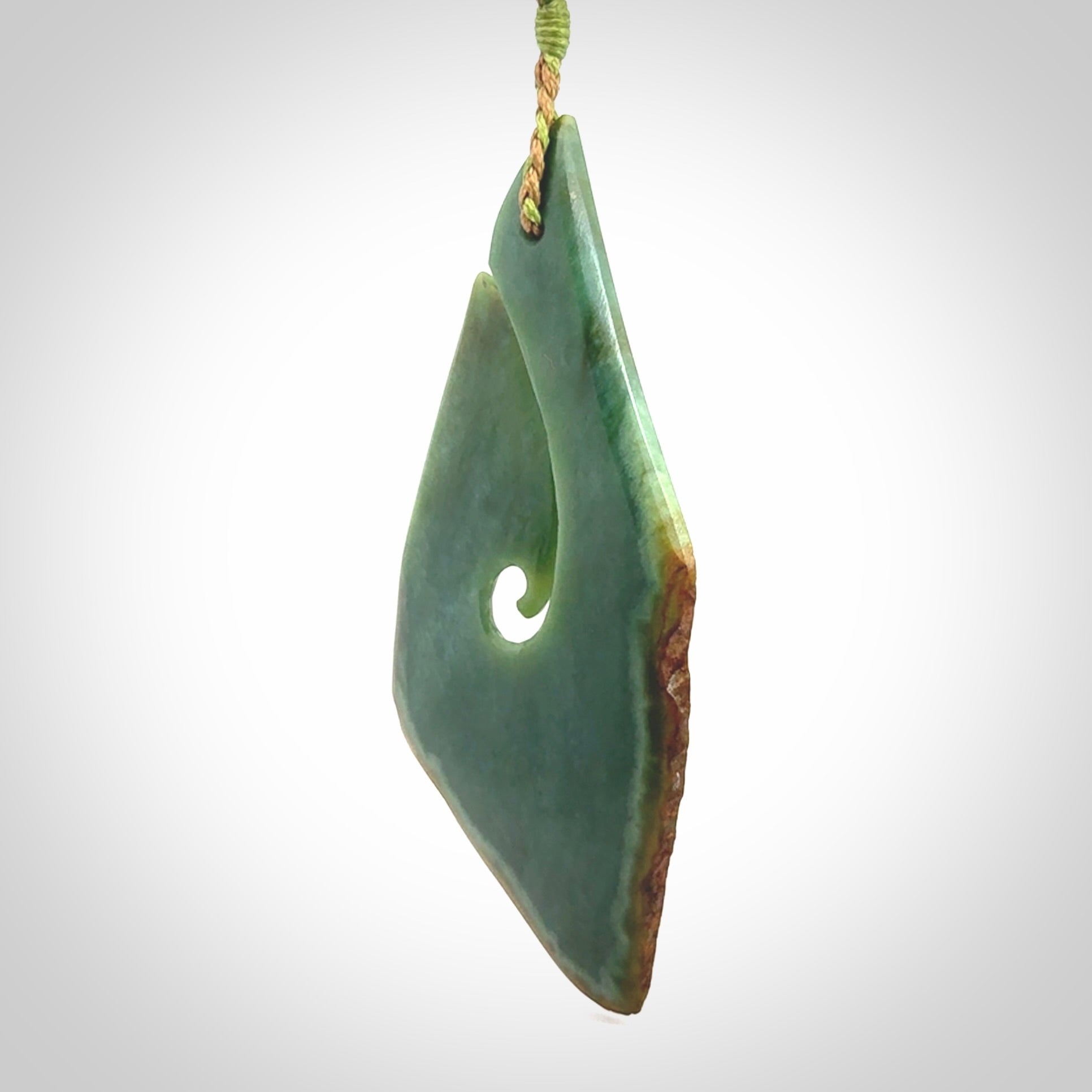 Hand carved New Zealand jade hook, matau pendant.