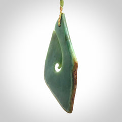 Hand carved New Zealand jade hook, matau pendant.
