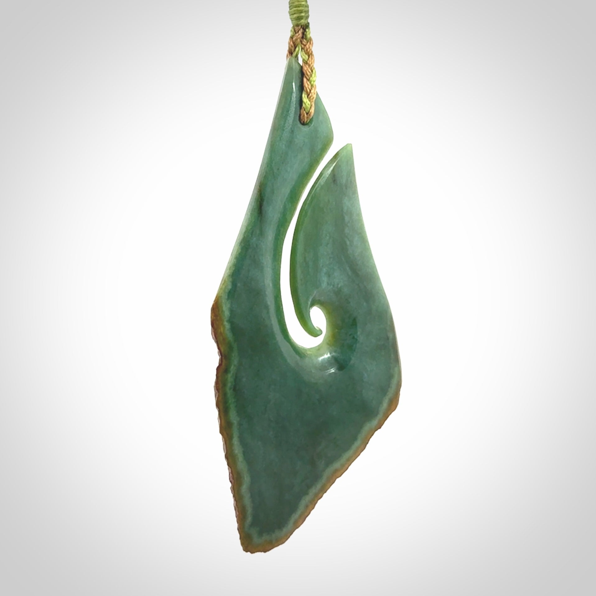 Hand carved New Zealand jade hook, matau pendant.