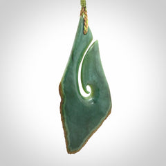 Hand carved New Zealand jade hook, matau pendant.