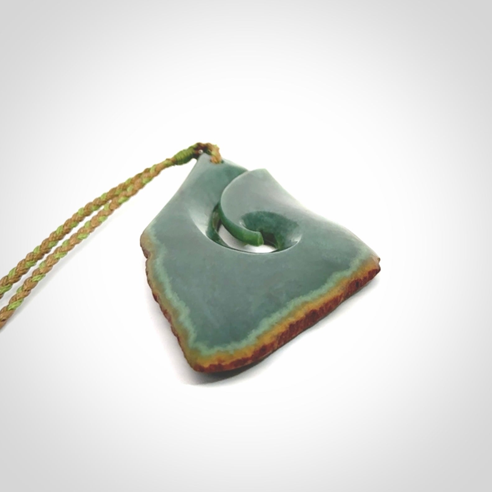 Hand carved New Zealand jade hook, matau pendant.