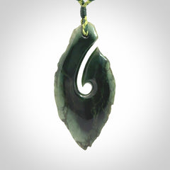 Hand carved New Zealand jade hook, matau pendant.
