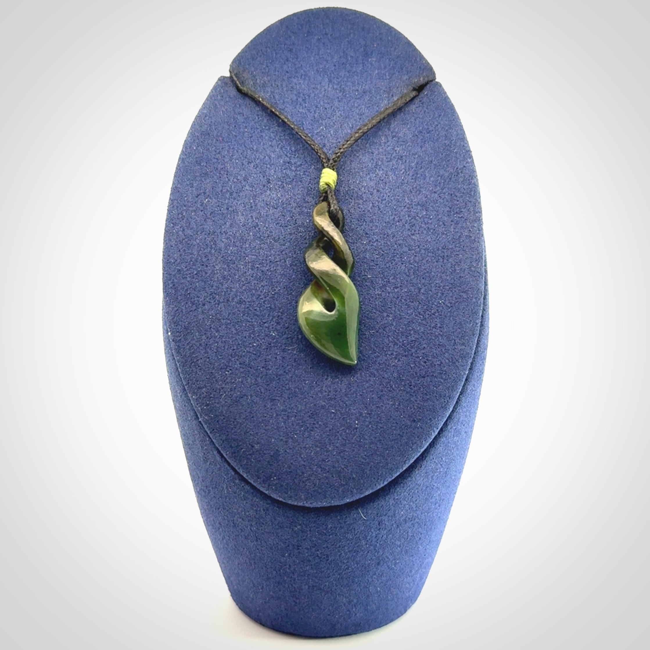 A sublime twist pendant carved in gorgeous jade