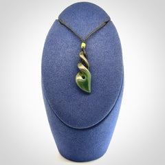 A sublime twist pendant carved in gorgeous jade