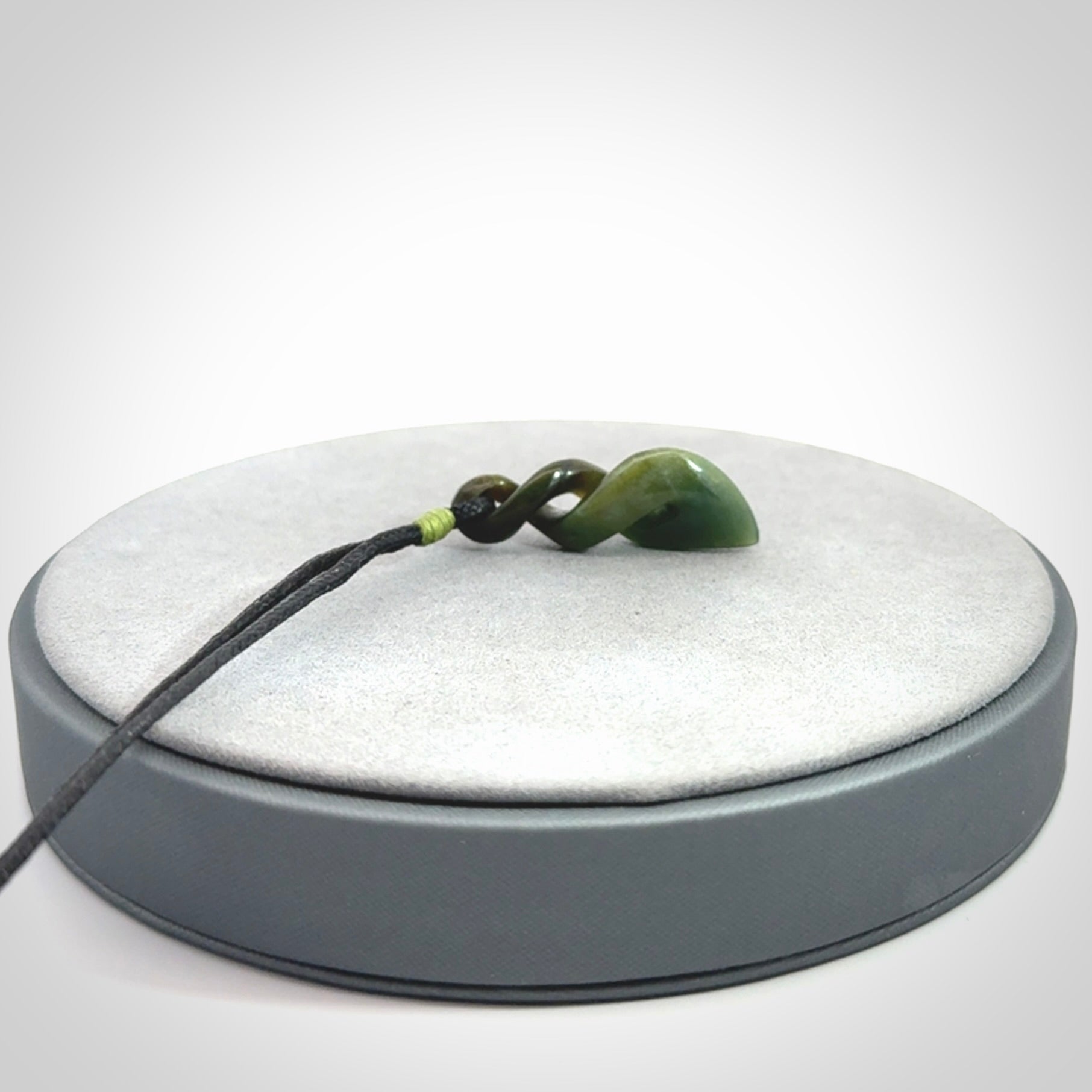A sublime twist pendant carved in gorgeous jade