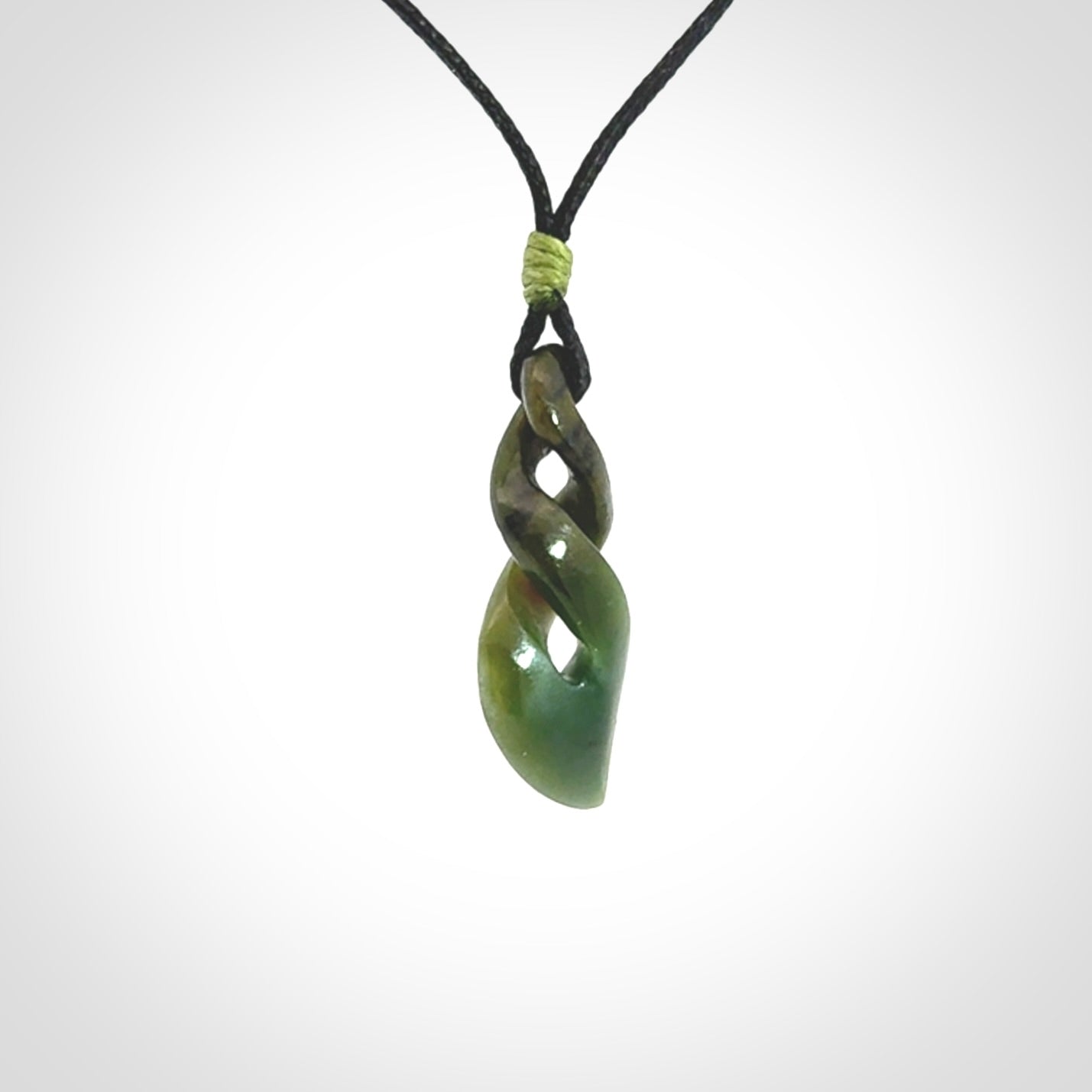 A sublime twist pendant carved in gorgeous jade