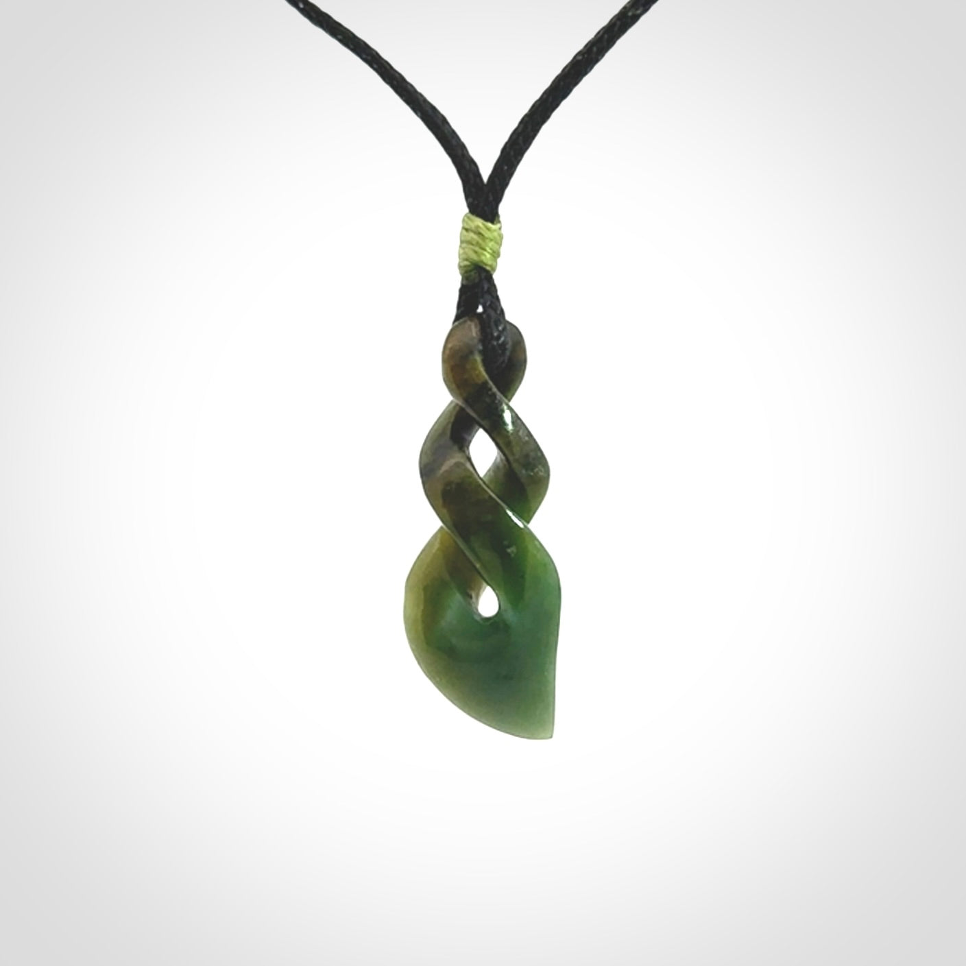 A sublime twist pendant carved in gorgeous jade