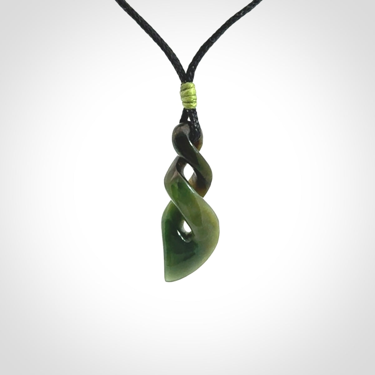 A sublime twist pendant carved in gorgeous jade
