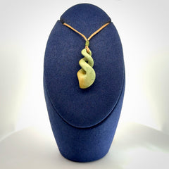 A gorgeous little twist pendant carved in New Zealand Jade