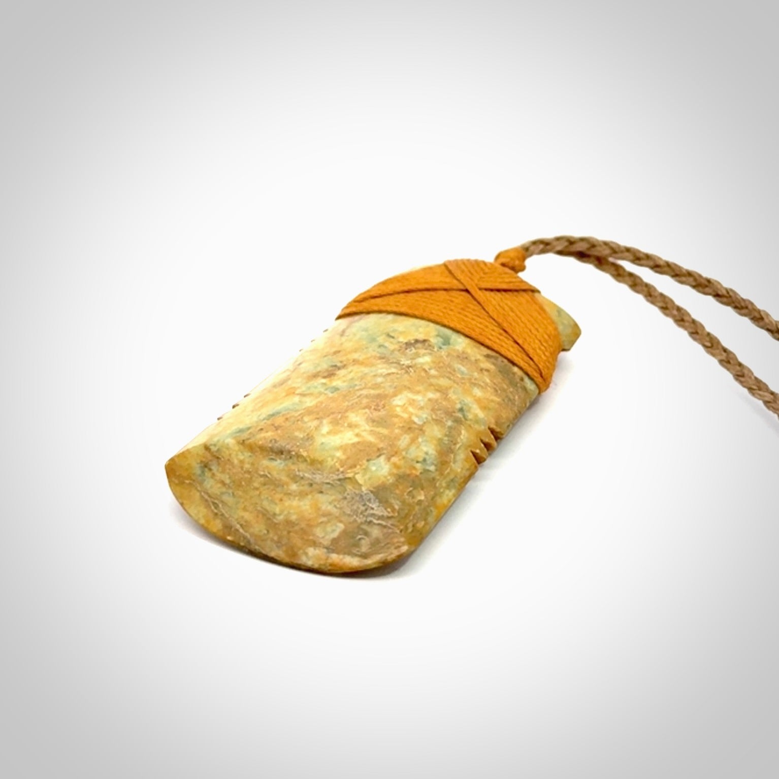 This is a lovely medium sized notched toki pendant made from a gorgeous New Zealand Flower Jade.