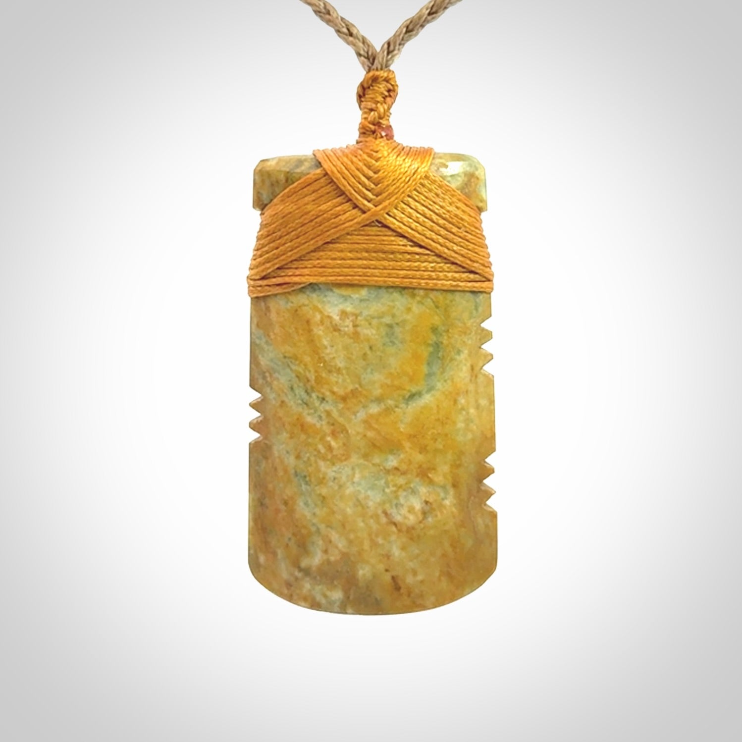 This is a lovely medium sized notched toki pendant made from a gorgeous New Zealand Flower Jade.